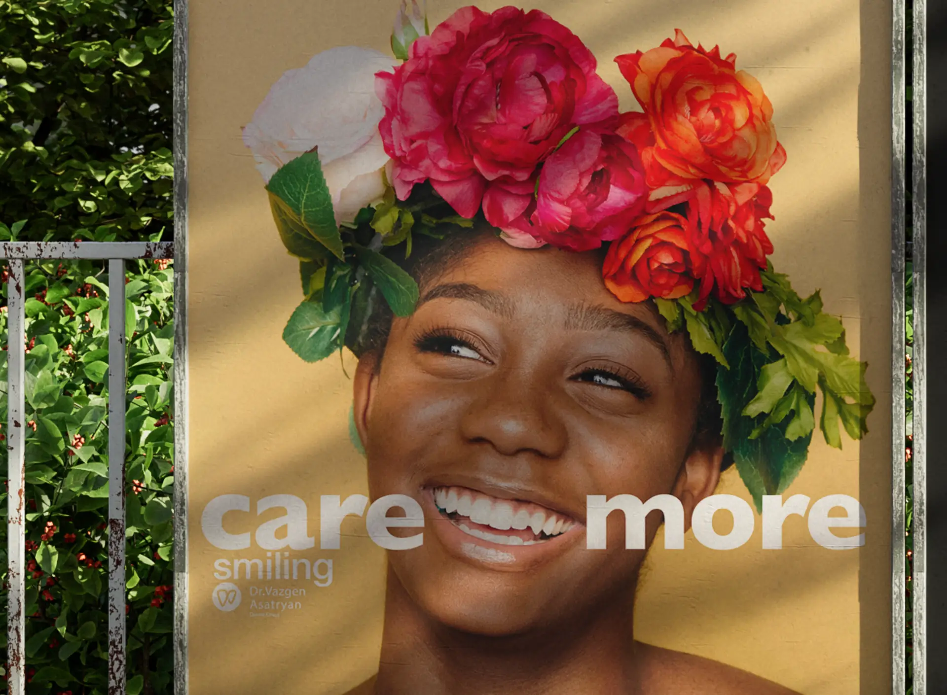 Outdoor poster of a smiling woman wearing a floral crown with the text 'care more' for dental campaign
